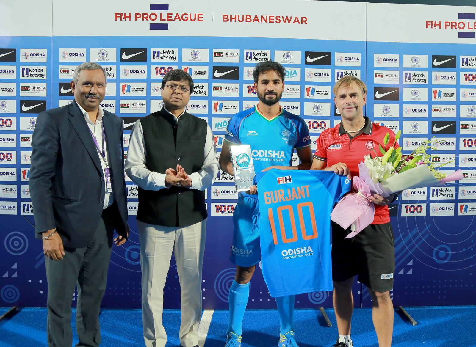 Gurjant Singh being felicitated by Hockey India for playing 100 international matches